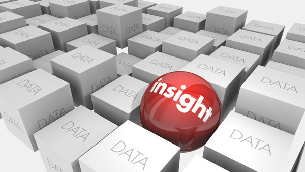 Three dimensional light gray blocks that are different heights with a red shiny sphere that says insight in white letters among the blocks.